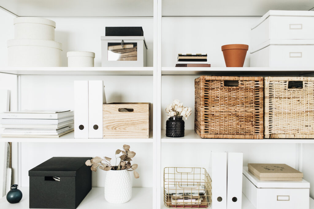 Bookshelf with storage baskets, boxes and bins.